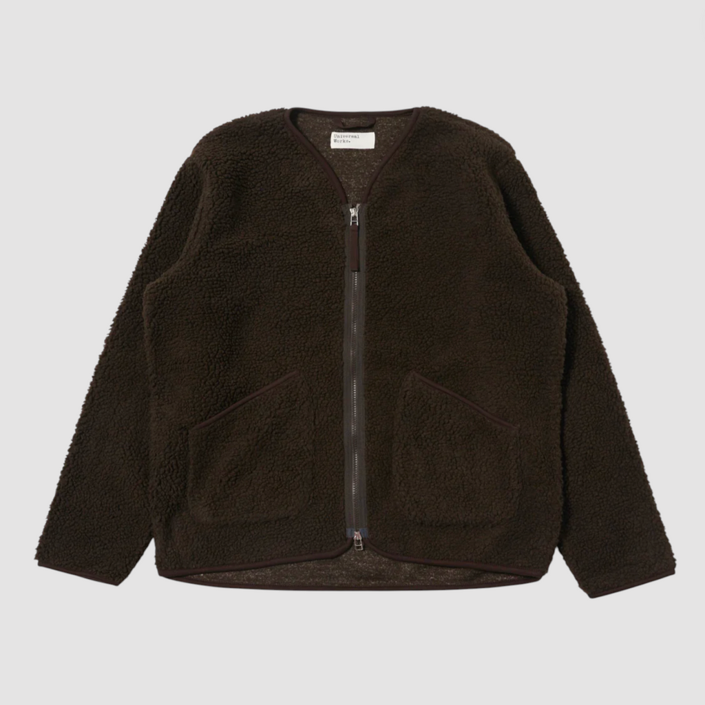 Dark brown fleece jacket with a zipper on a light gray background.