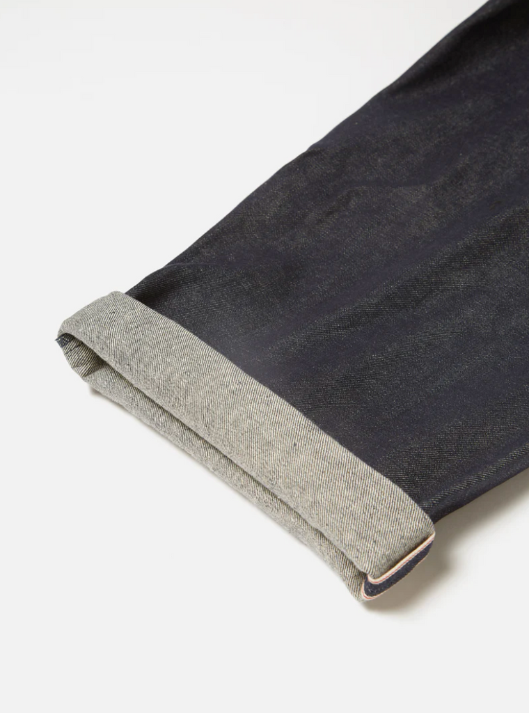 Universal Works Military Chino in indigo 13oz red selvedge denim, vintage-style, made in Portugal.