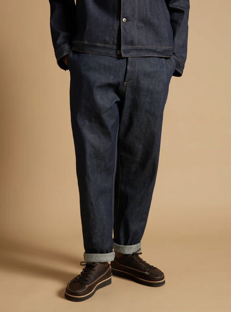 Universal Works Military Chino in indigo 13oz red selvedge denim, vintage-style, made in Portugal.
