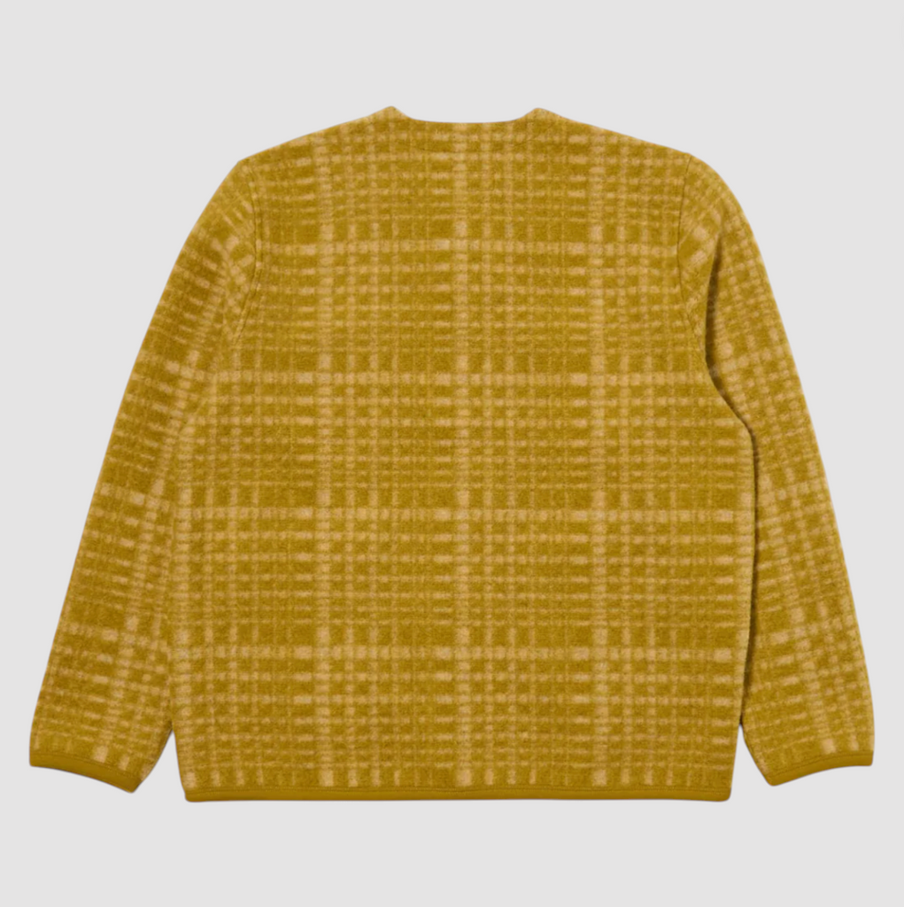 Yellow plaid sweater on a light gray background.
