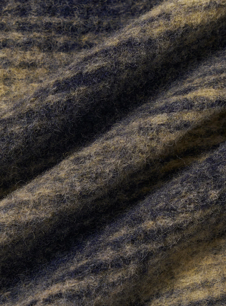 Beige and navy checkered print fleece fabric.