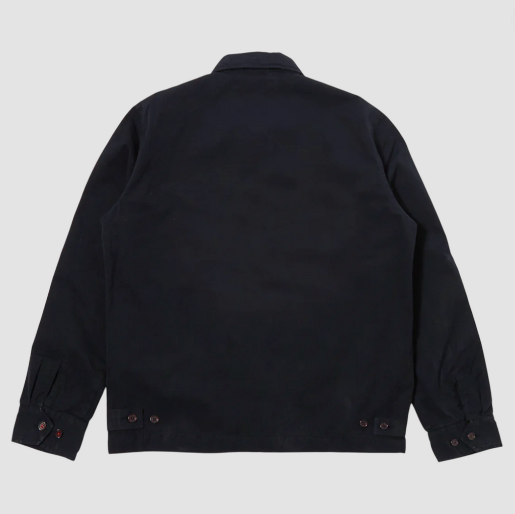 Navy cotton jacket with a double zip front, welt pockets, subtle arm stripe detail, and adjustable cuffs and waist tabs.