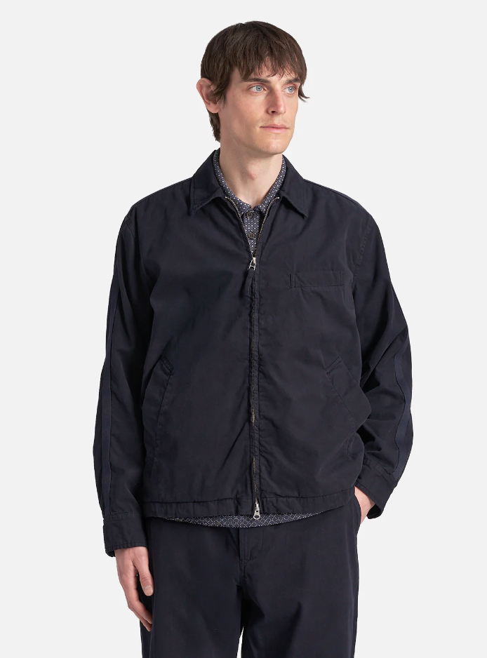 Navy cotton jacket with a double zip front, welt pockets, subtle arm stripe detail, and adjustable cuffs and waist tabs.
