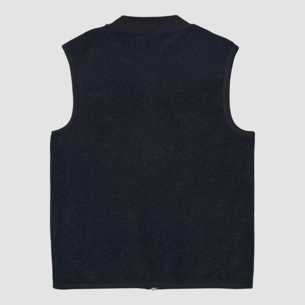 Navy sleeveless vest on a light gray background.