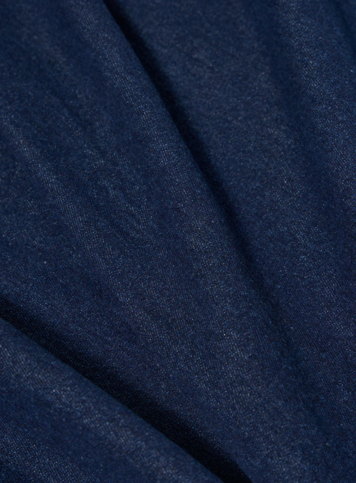 Close-up of dark blue fabric texture.