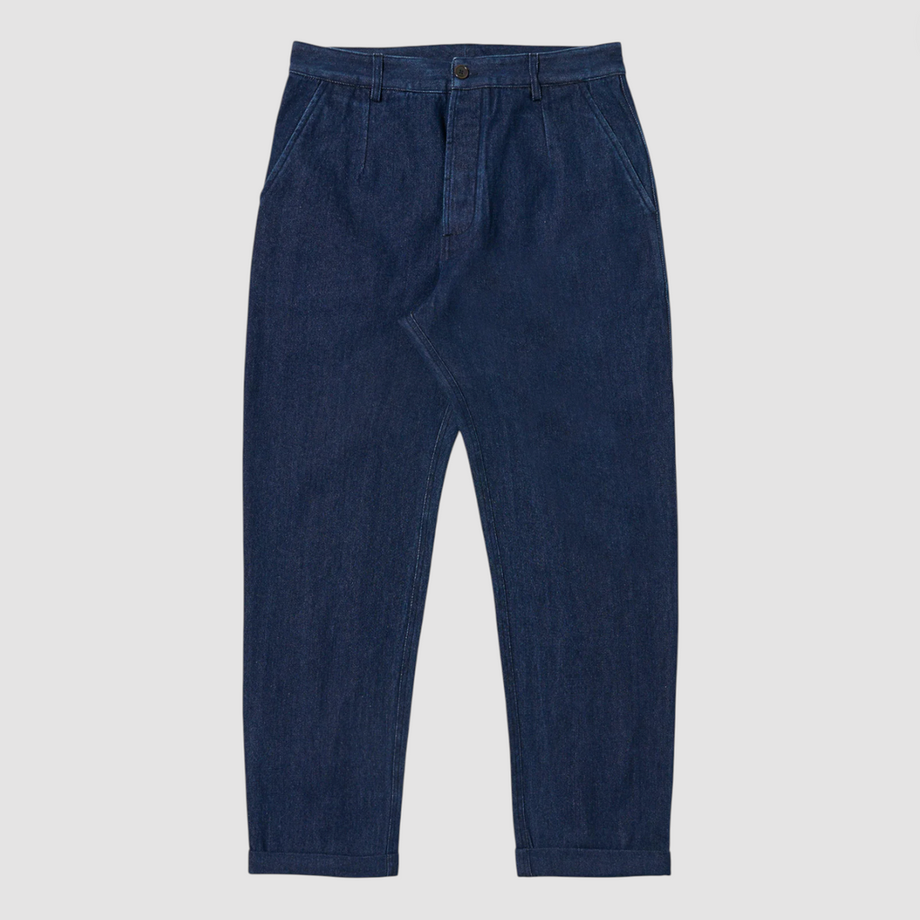 Blue denim pants on a light gray background.